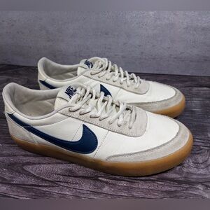 Nike White Leather Low Top Sneakers
Gum Sole Navy Swoosh Size 8